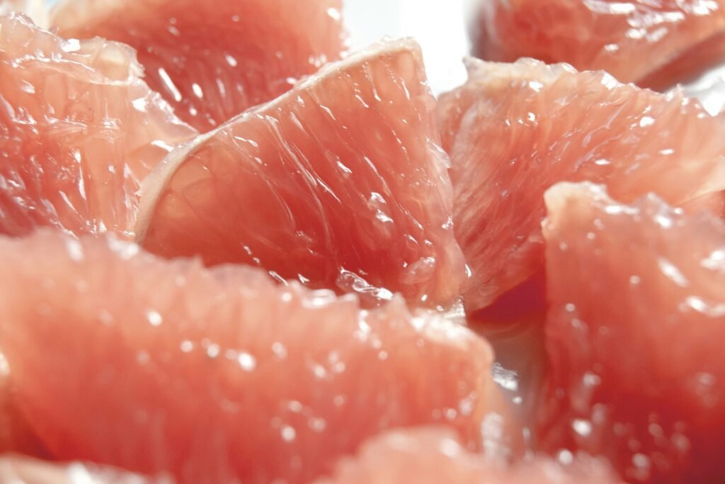 close up photo of sliced fruit close up photo of sliced fruit