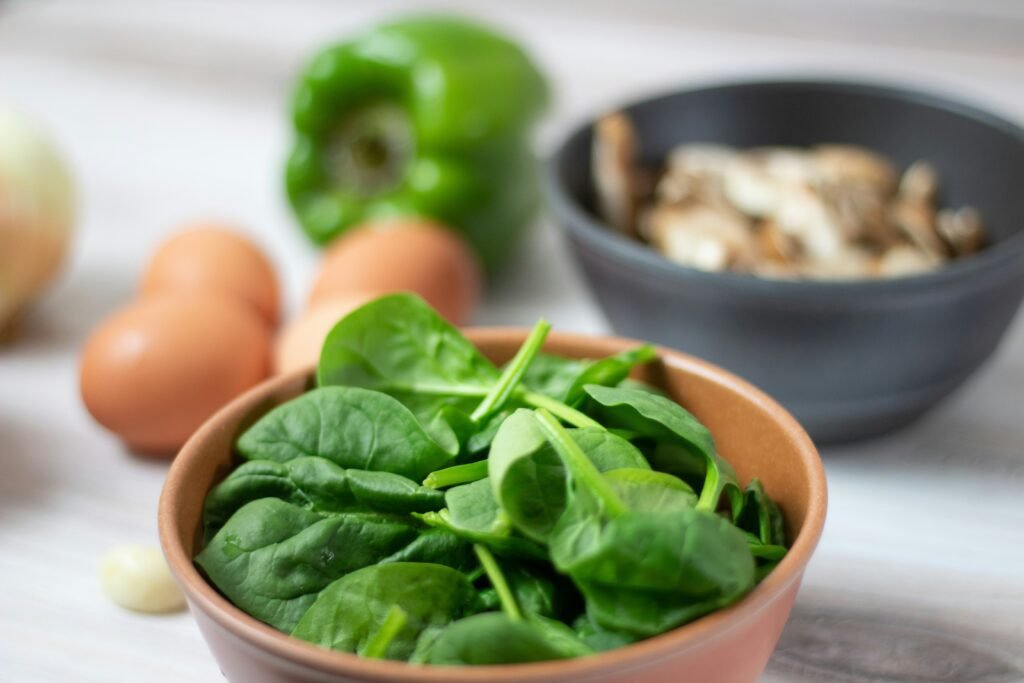 green vegetable on white ceramic bowl green vegetable on white ceramic bowl