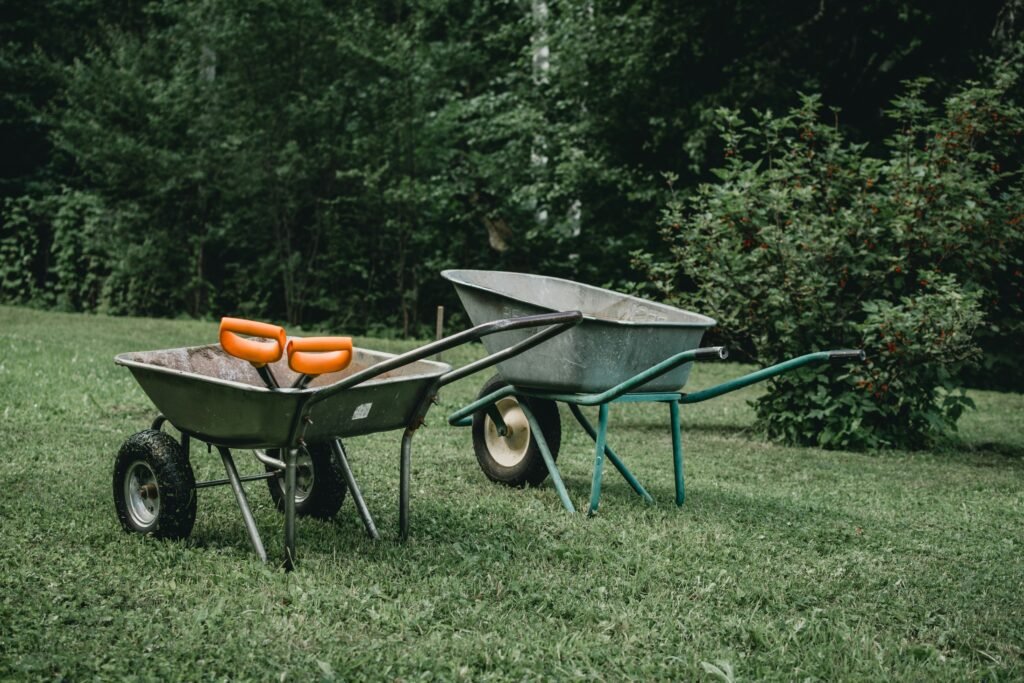 two grey wheelbarrows two grey wheelbarrows
